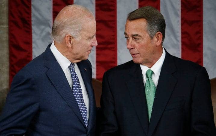 House Speaker John Boehner of Ohio, right, and Vice President Joe Biden chatted before Pope Francis arrived to address a joint meeting of Congress on Capitol Hill in Washington DC Sept. 24, 2015. (Carolyn Kaster / AP)
